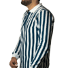 Man wearing old money polo with blue and white stripes shown in side profile